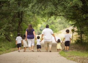 foster family walking with kiddos